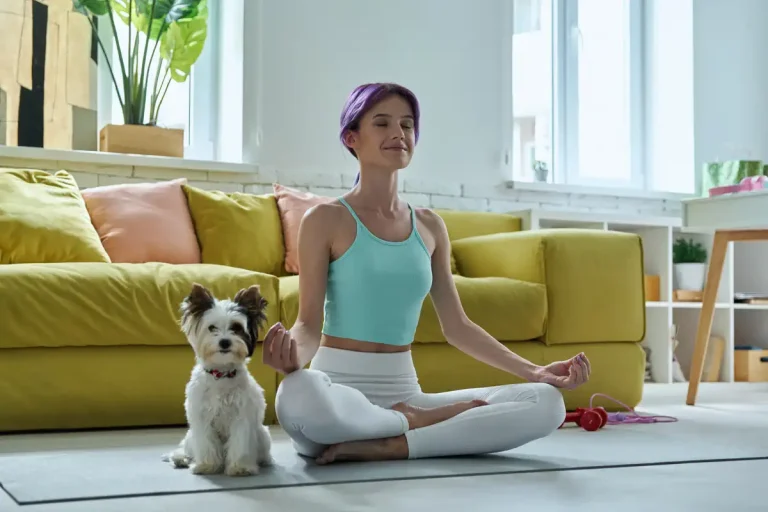 woman and dog meditating